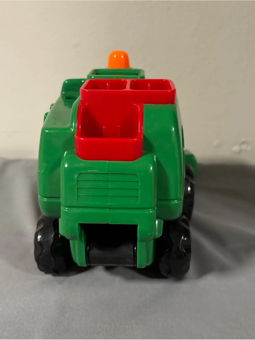 Green Farm Combine Toy with Red Accents